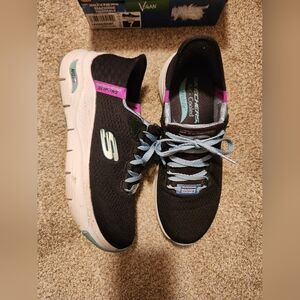 Skechers Women's Black Slip-On Athletic Sneakers with Light Blue Accents